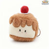 Strawberry cake plush charm by ToyNeighbor, 3.5" soft stuffed fruit cake pendant with vibrant red and green details.