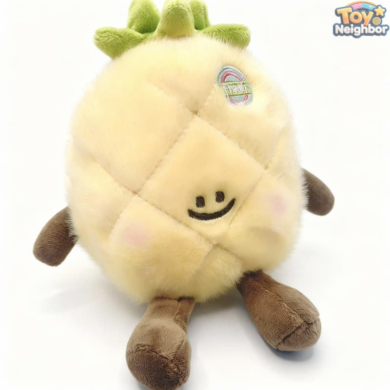ToyNeighbor plushie fruit keychain, featuring vibrant colors and soft texture, hanging against a white background.