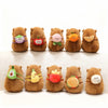 Brown capybara plushie from ToyNeighbor with a colorful food backpack, perfect for cuddling and playtime.