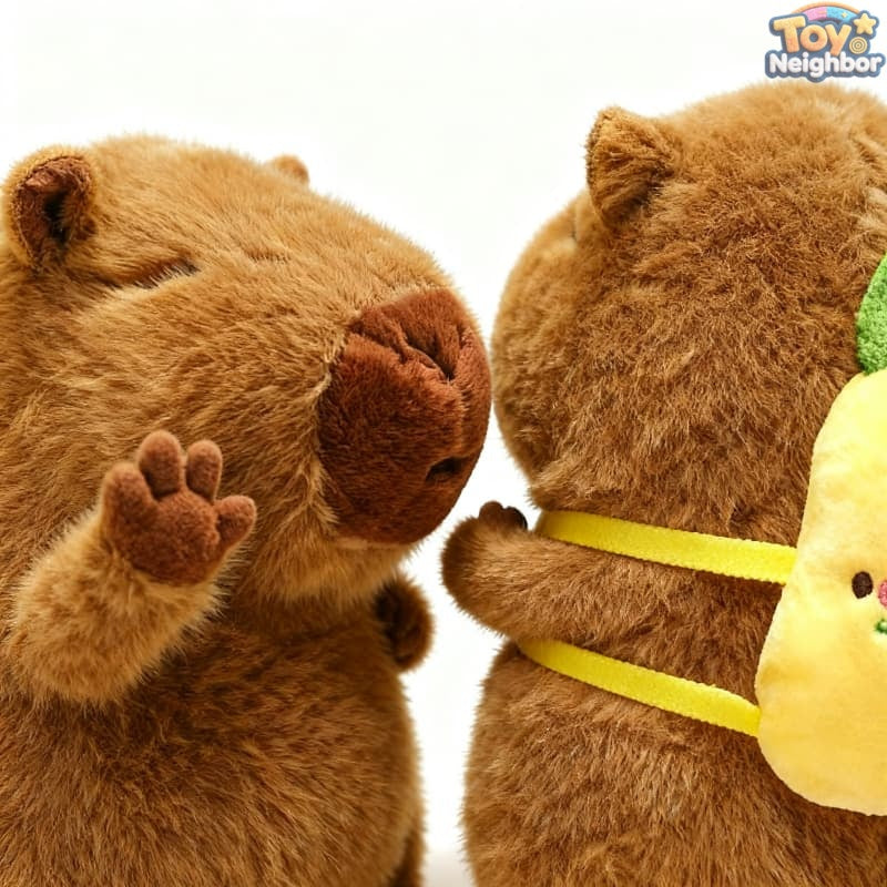 Brown capybara plushie from ToyNeighbor with a food backpack, featuring a cute and cuddly design for stuffed animal lovers.
