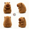 Brown capybara plushie with a detachable apple bag, measuring 7.8 inches, from ToyNeighbor. Cute stuffed animal design.