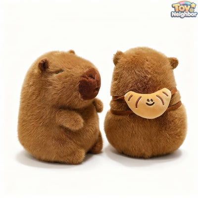 Brown capybara plushie with a croissant bag, 7.8 inches tall, soft and cute stuffed animal by ToyNeighbor.