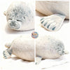 Soft gray spotted seal plushie from ToyNeighbor, featuring closed eyes and a cuddly design, measuring 7-23 inches.